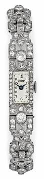 1342. A diamond ladie's wrist watch, tot. app. 3.50 cts, c. 1925.