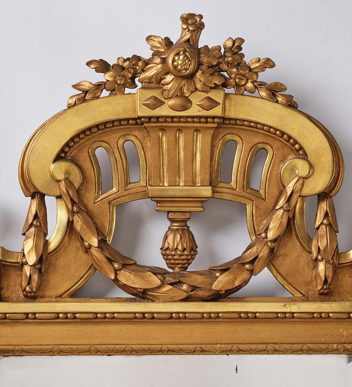 A Gustavian giltwood mirror, Stockholm, late 18th century.