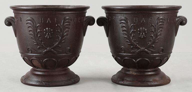 A pair of Ivar Johnsson cast iron jardinieres, Näfveqvarn, Sweden.