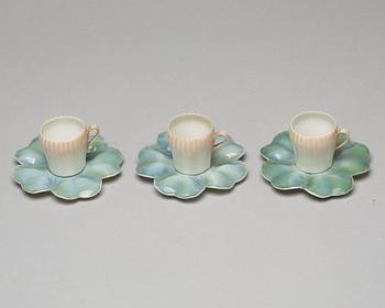 A set of six (3+3) cups with stands, Denmark, Bing & Gröndahl, early 20th Century.