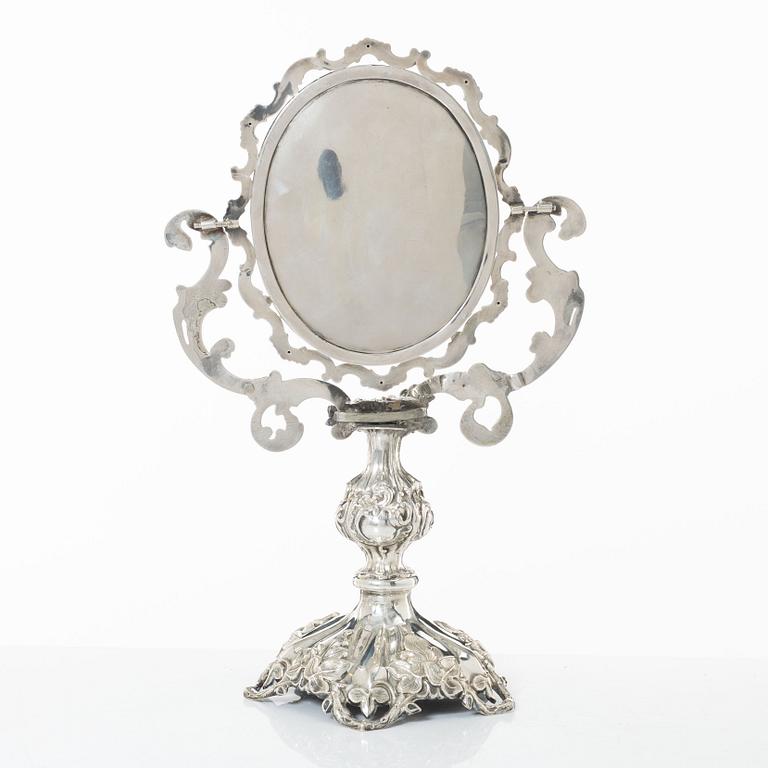 A Swedish silver dressing table mirror on stand, mark of Gustaf Möllenborg, Stockholm 1856.