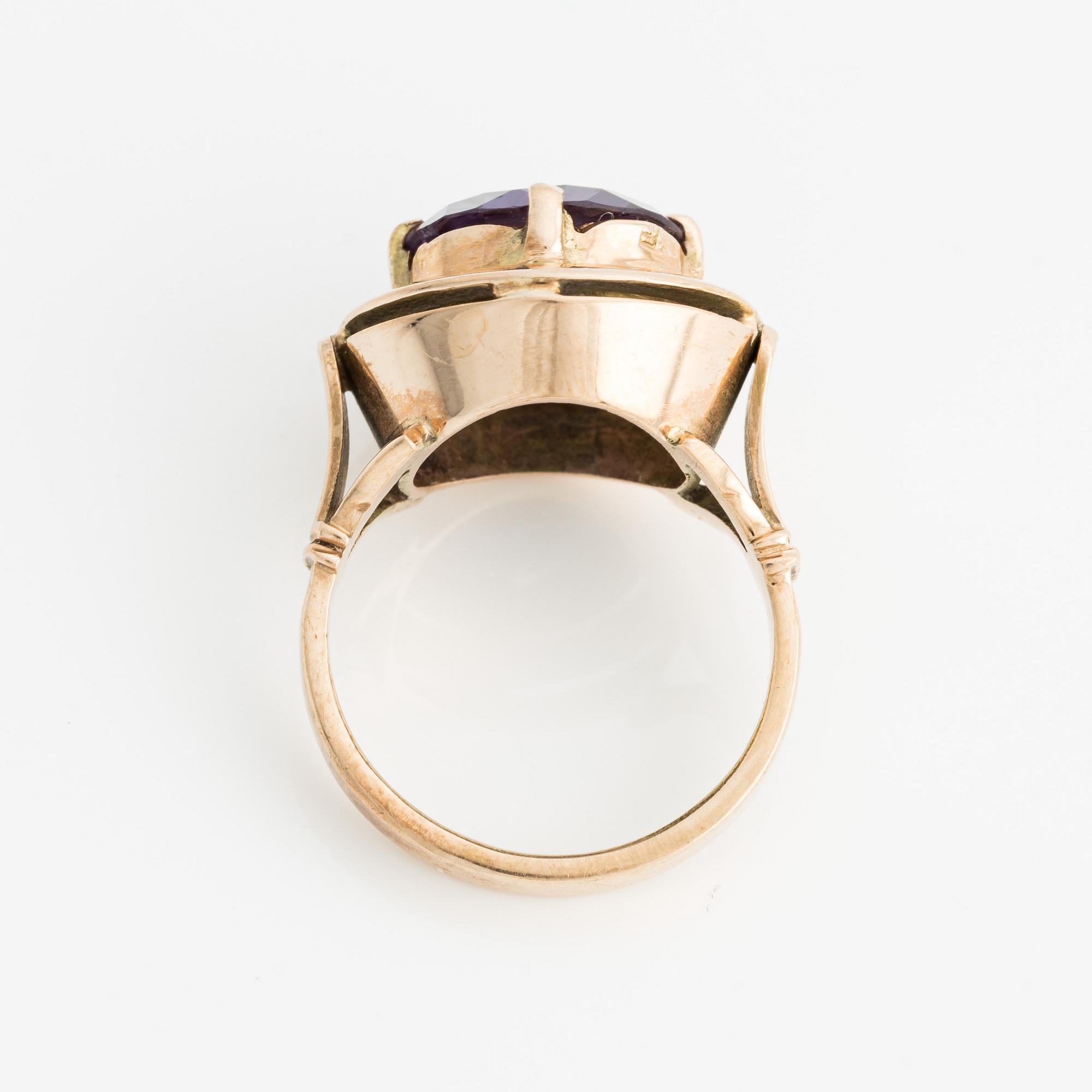 Bracelet and ring with color-changing synthetic stones.