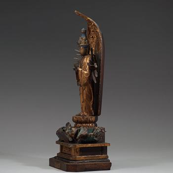 A Japanese wooden sculpture of Bodhisattva Kannon Senju, Edo period, 18th Century.