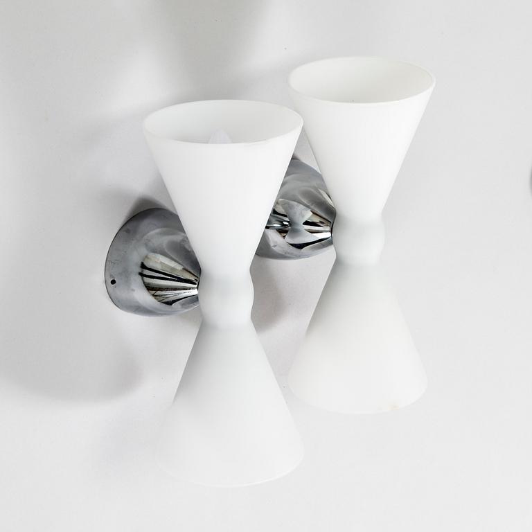 A pair of early 2000s wall lamps.
