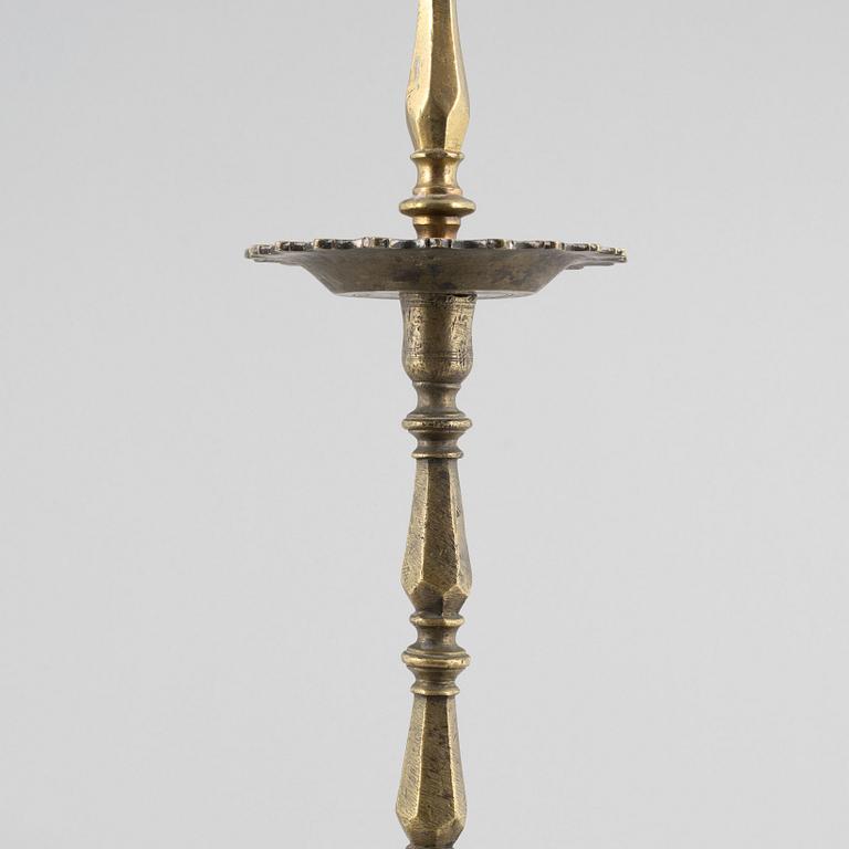 A Baroque-style floor candle stick, around 1900.