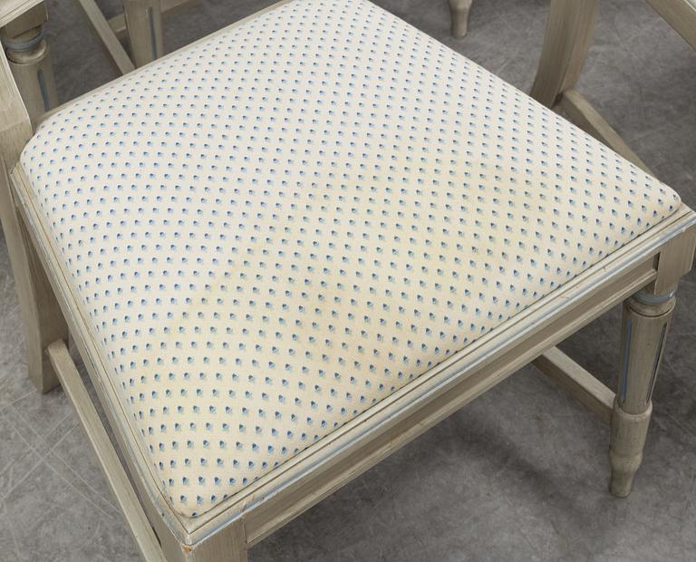 A dining table and six chairs, Gustavian style, second half of the 20th century. One leaf included.