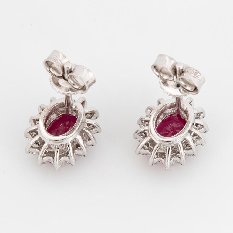 Ruby and brilliant-cut diamond earrings.