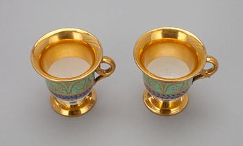 A PAIR OF CREAM CUPS.