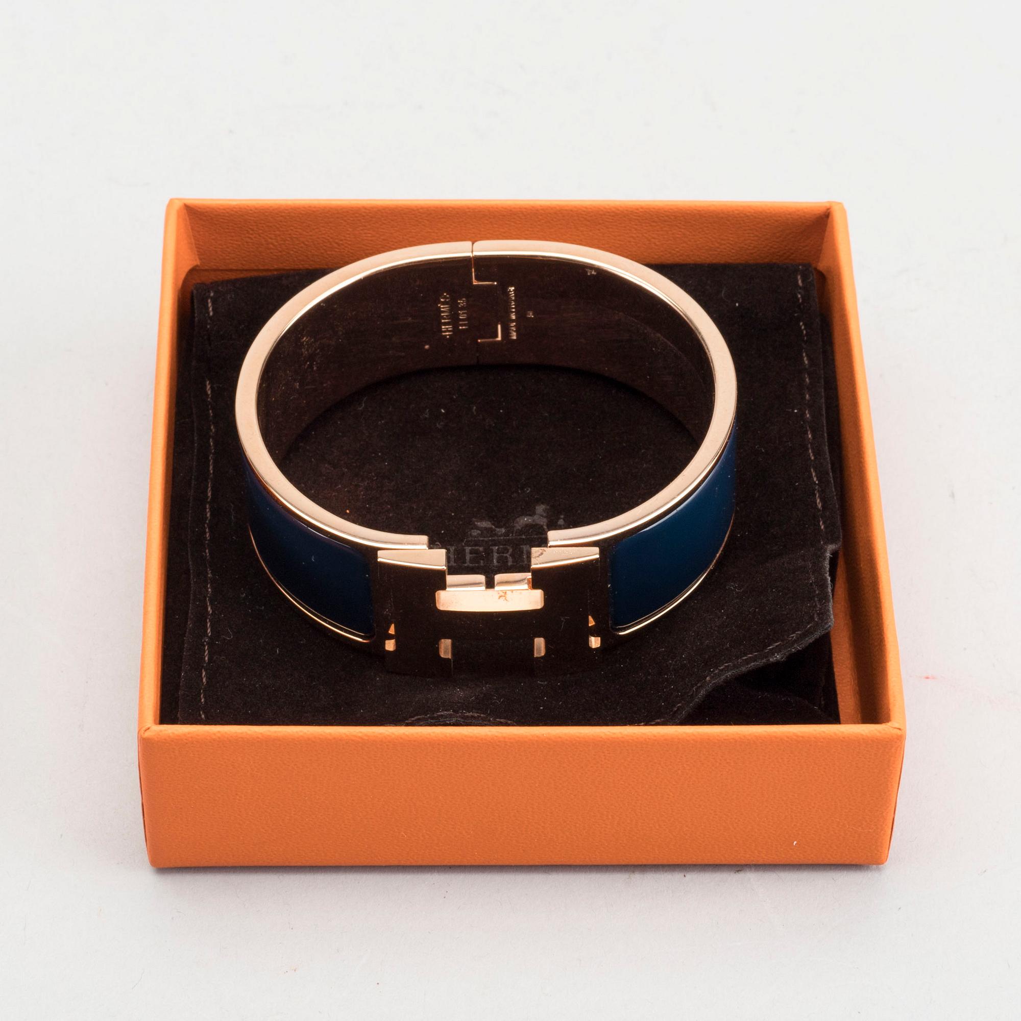 A Hermès "Clic-H" bracelet.