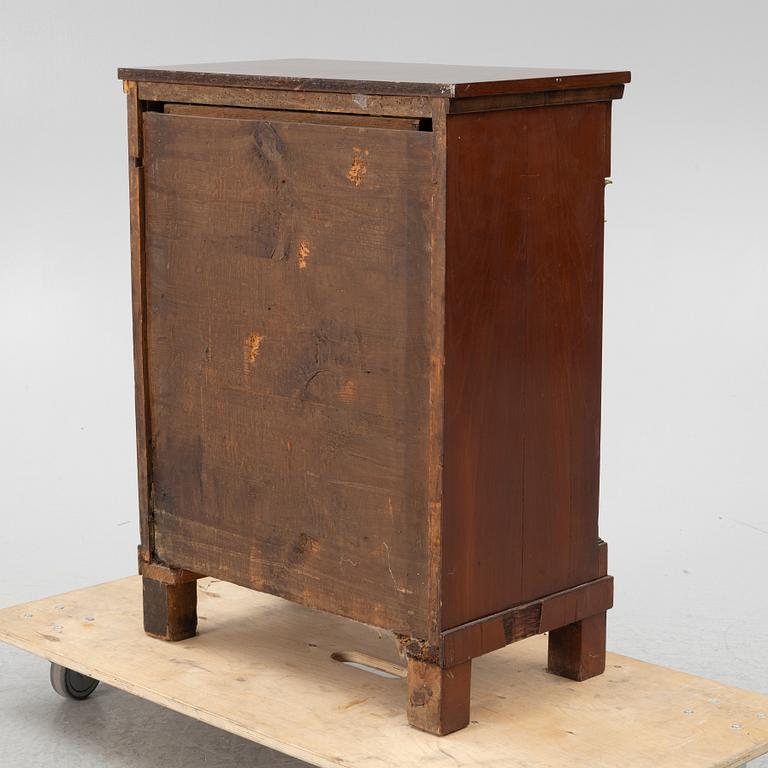 An Empire cabinet, first half of the 20th Century.