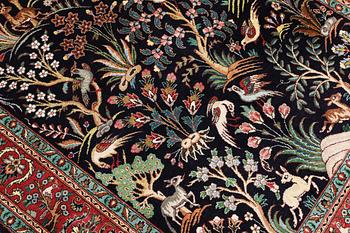 A Tabriz silk rug, approx. 155 x 100 cm.