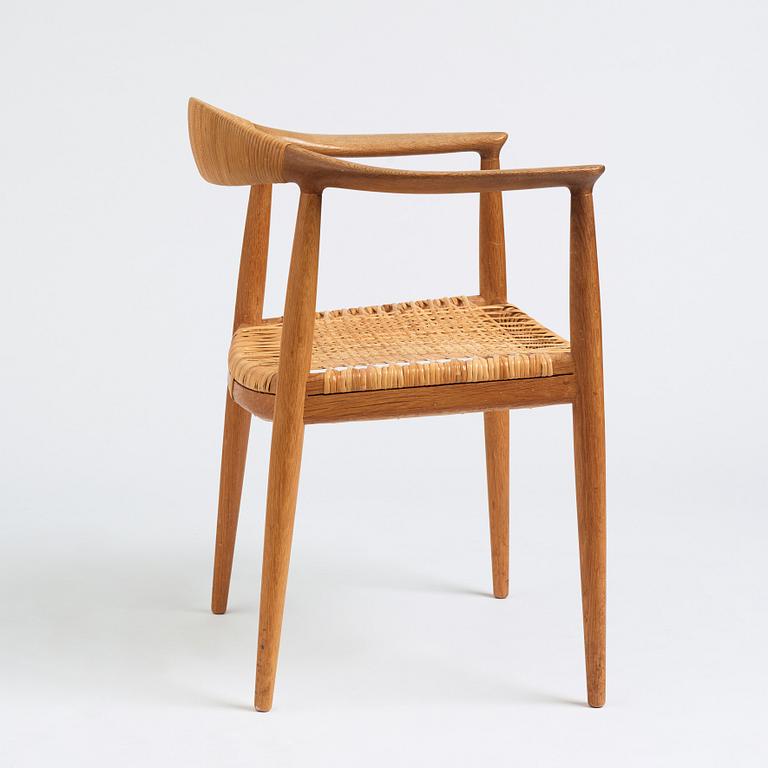 Hans J. Wegner, an oak and rattan 'The Chair', JH501, Johannes Hansen, Denmark.