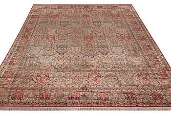 A carpet, silk Kashmir, ca 428 x 299 cm.