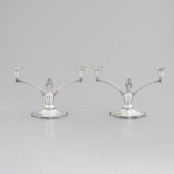 A pair of silver candelabra, Swedish import marks, probably 1920's/30's.