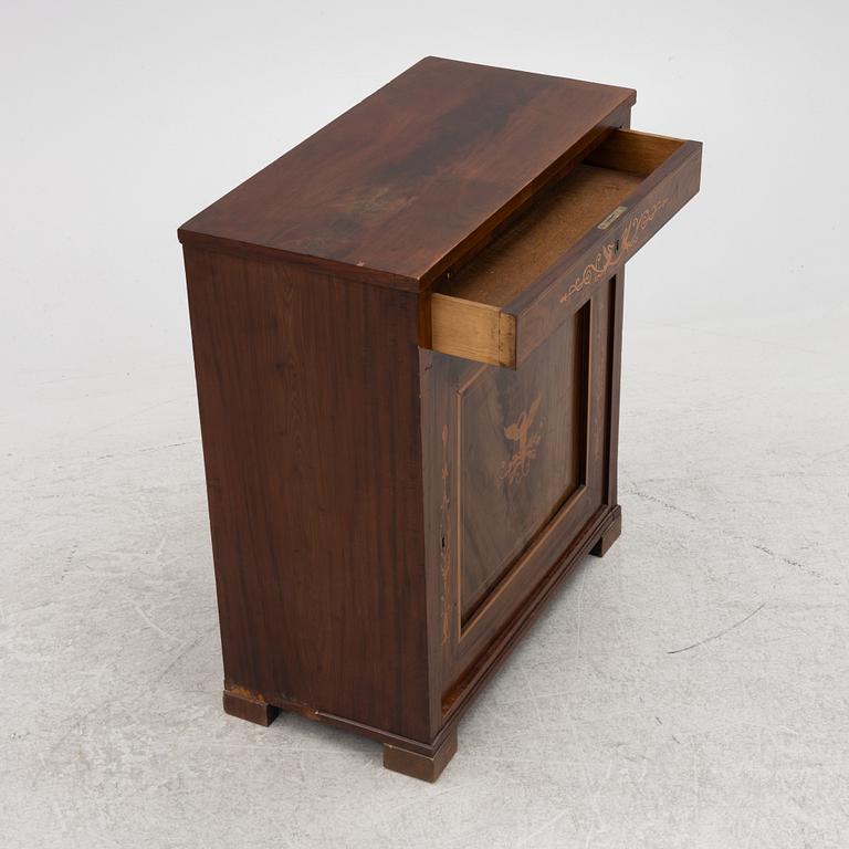 A late Empire cabinet, mid 19th Century.