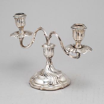 A rococo style silver candelabra, marked CG Hallberg, Stockholm 1928.