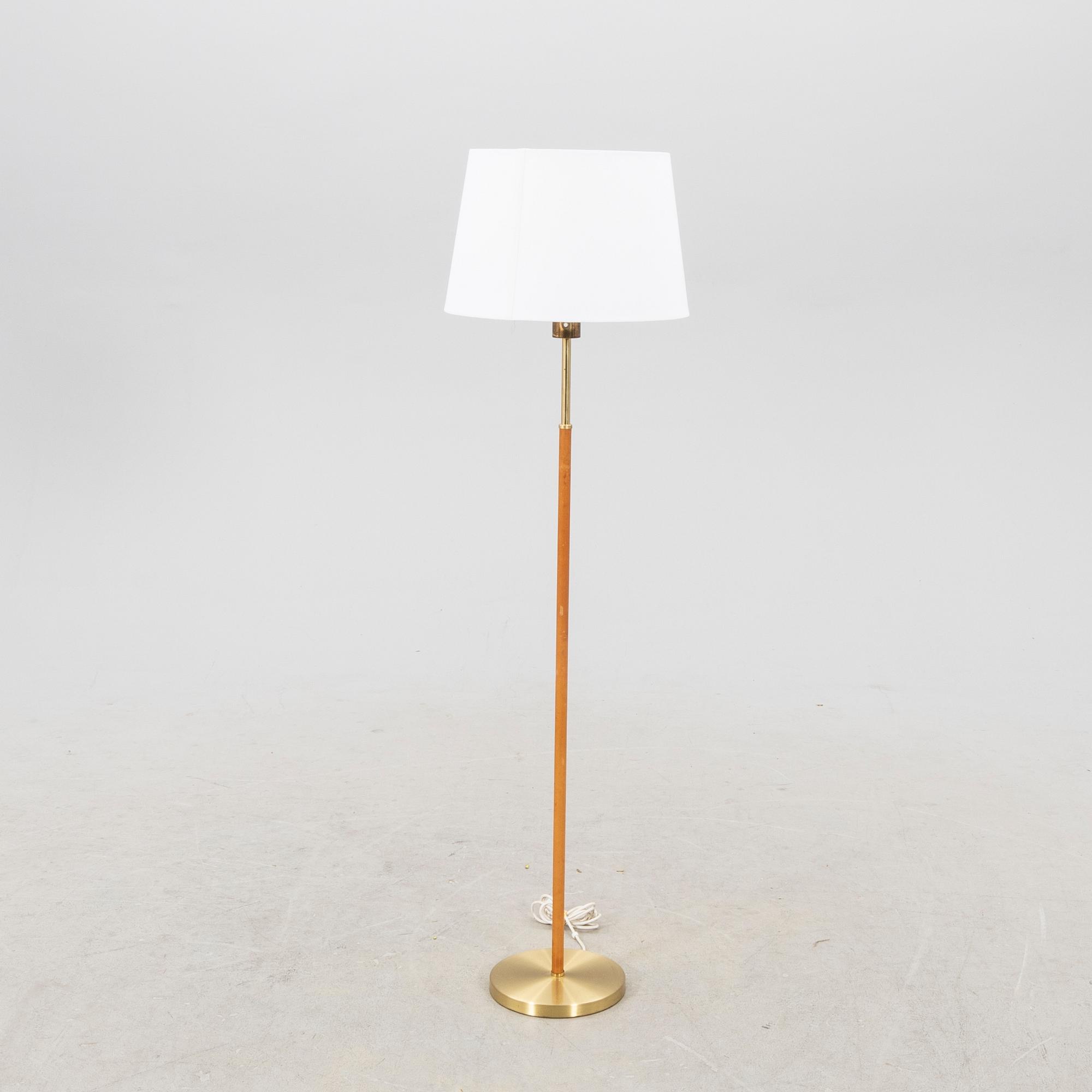 Hans Bergström, a brass and leather floor lamp Ateljé Lyktan.