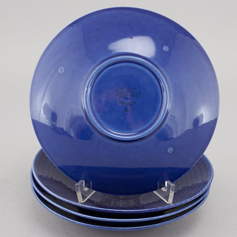 A set of tableware by Hertha Bengtsson called Blå Eld for Gustavsberg during late 20th century.