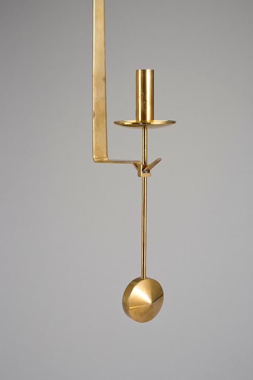VÄGGLAMPETTER, 2 stycken, mässing, "Pendeln", Pierre Forsell, Skultuna, 1900-talets fjärde kvartal.
