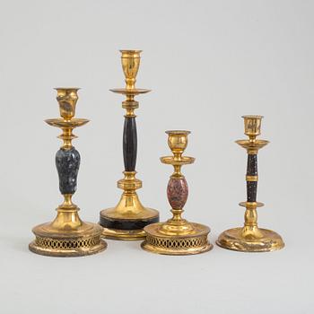 CARL HJALMAR NORRSTRÖM, four brass and stone candlesticks from Skultuna, numbered 073/300, 1997.