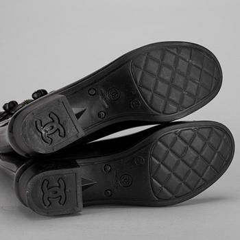 A pair of black Chanel Wellington boots, size 41.