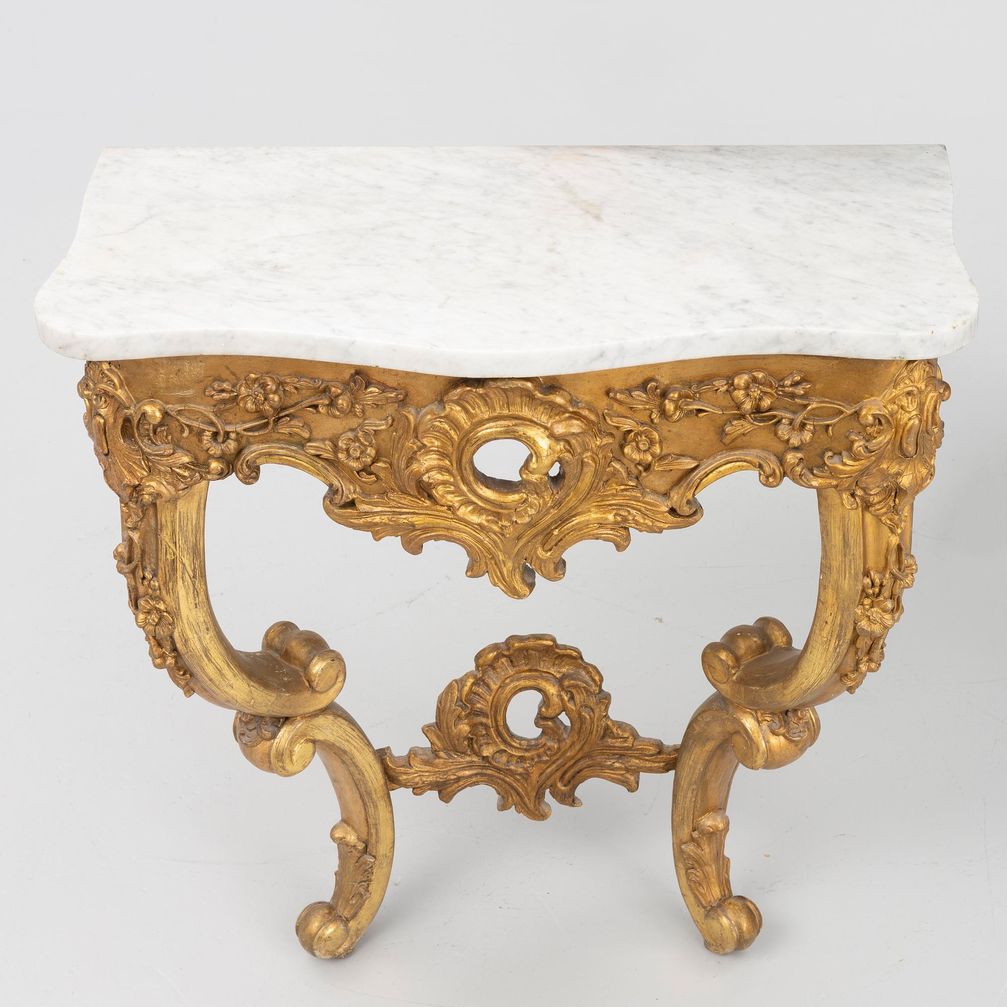 A Rococo style console table, late 19th Century.
