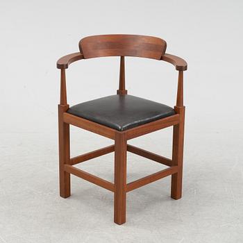 Torbjörn Ahlström, a mahogany chair.