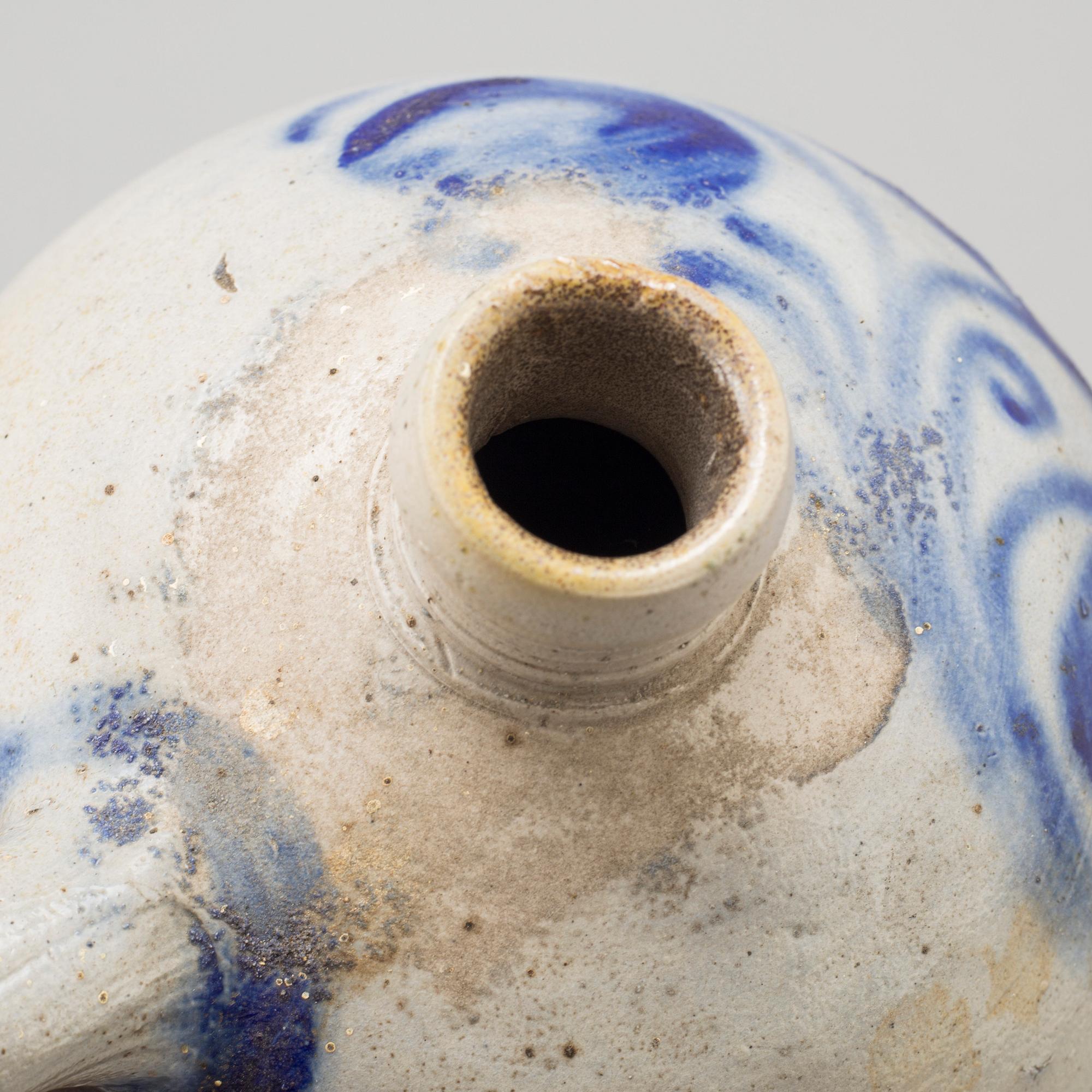 A 19th century stoneware jar marked B&N.