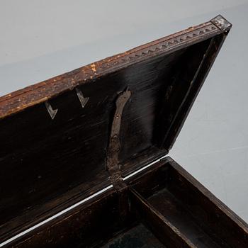 A late 18th or early 19th century wooden box on a stand from early 20th century.