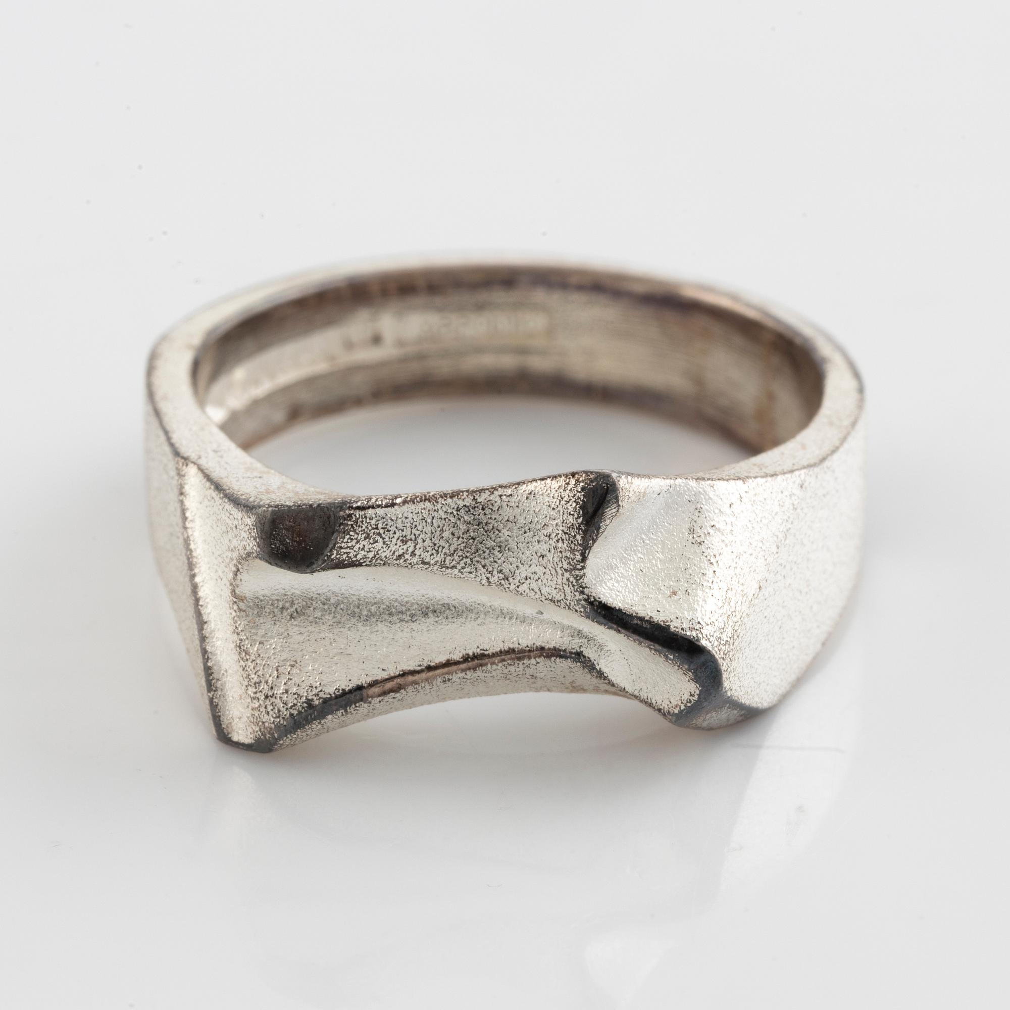 Lapponia, two sterling silver rings and tie ping.