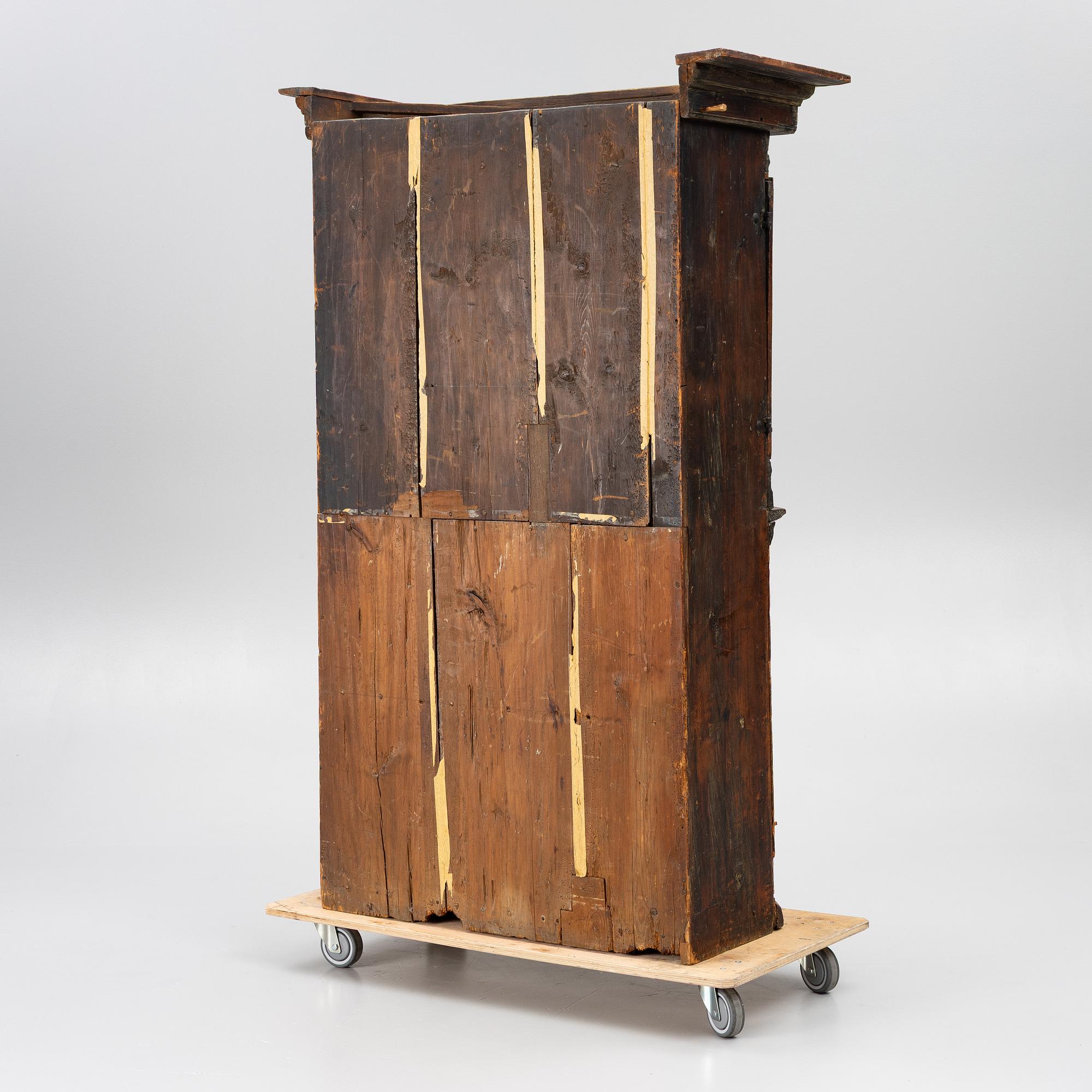 A pine cabinet, second half of the 18th Century.