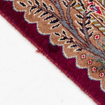 A Kashmar carpet, ca 295 x 202 cm.
