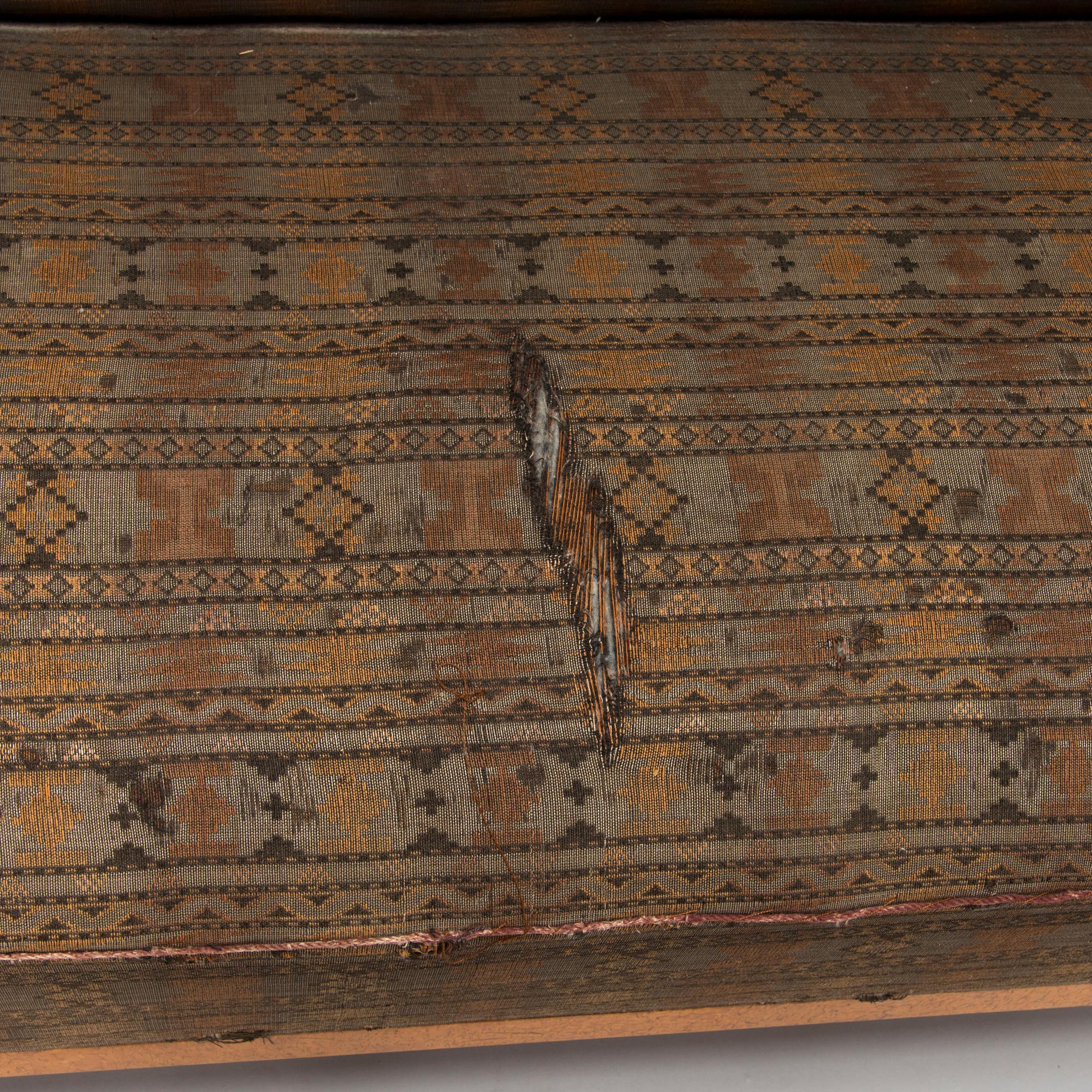 A  1920s Carelian birch veneered sofa.