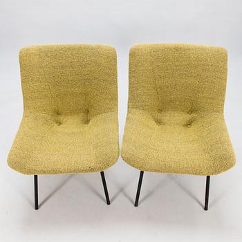 CARL GUSTAF HIORT AF ORNÄS, a pair of 'Leaf' easychairs, manufacturer Puunveisto Oy - Träsnideri Ab, mid-20th century.