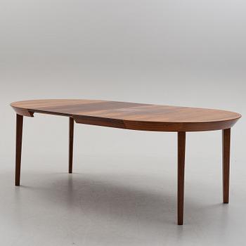 A 1950s/1960s rosewood veneer table.