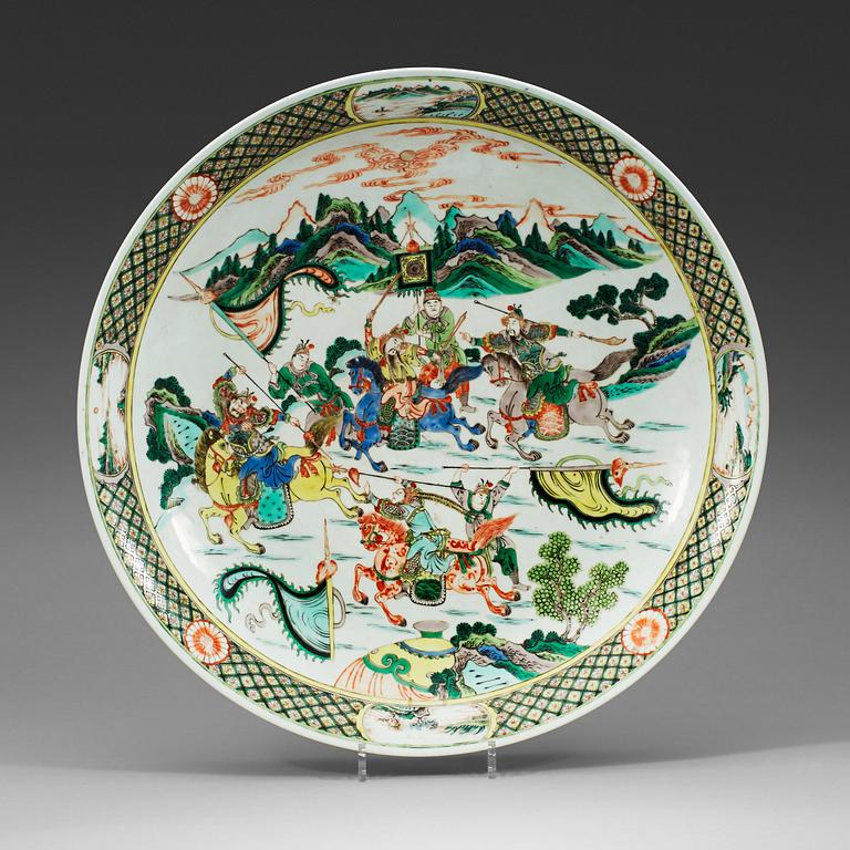 A large famille verte charger, Qing dynasty, 19th century, with Kangxis six character mark.