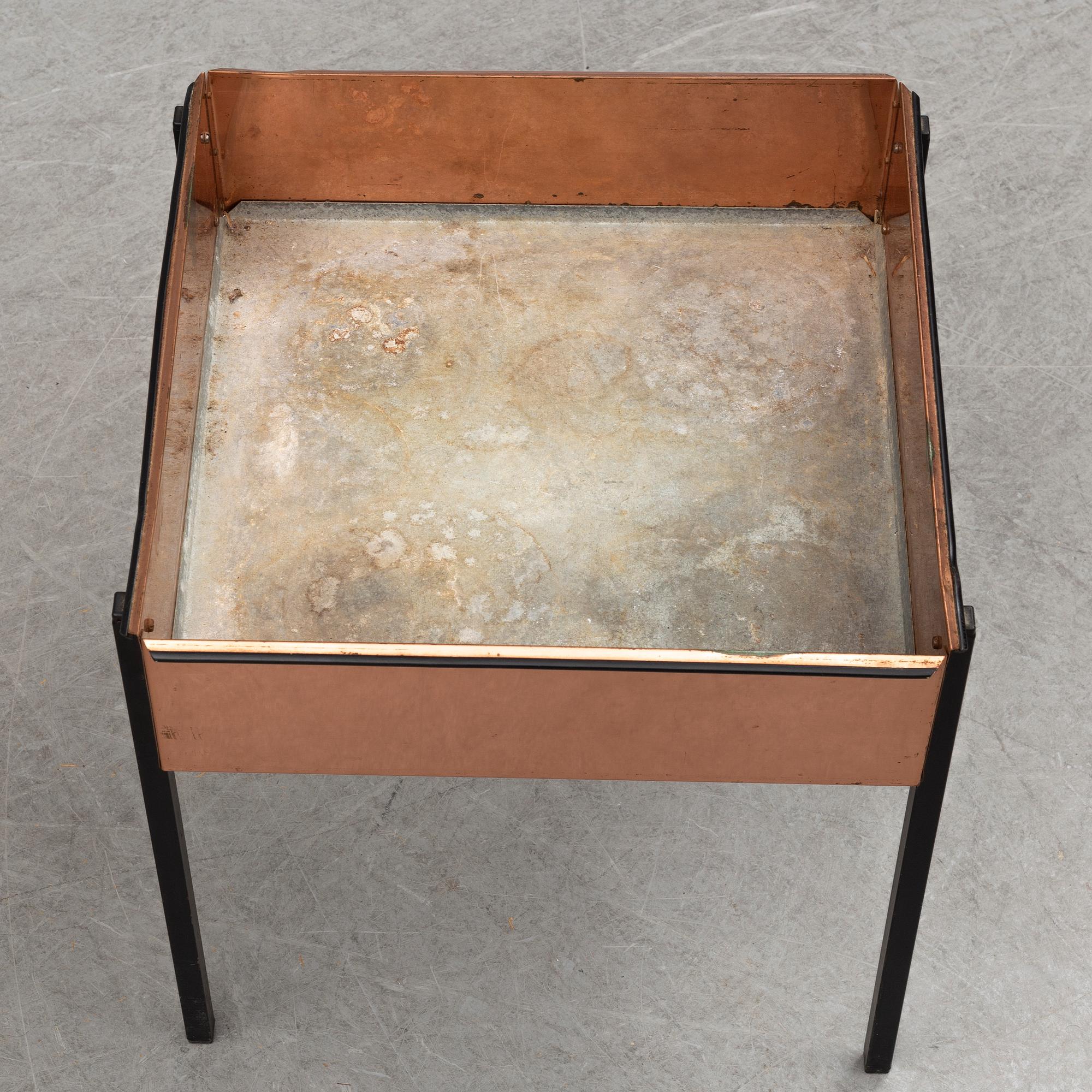 A second half of the 20th century copper flower table by Hans-Agne Jakobsson.