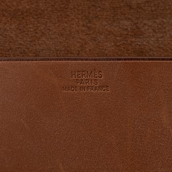 Hermès, a leather waist-bag, 2001.