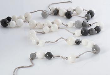 A quartz and mother of pearl necklace by Ole Lynggaard.
