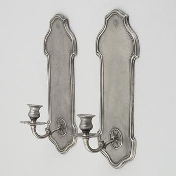 A pair of pewter wall sconces, 1920's/30's.