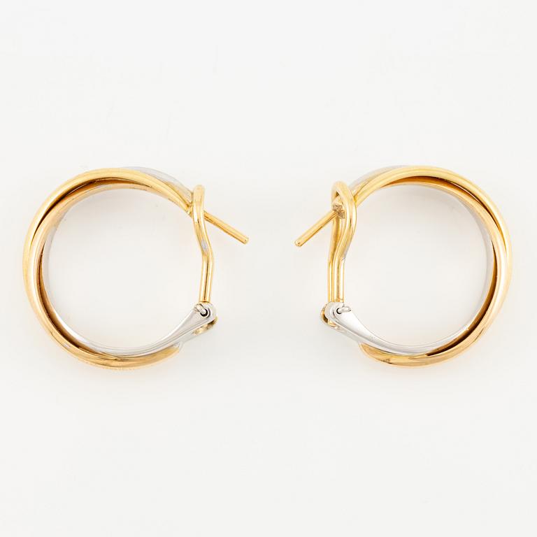 A Cartier a pair of "Trinity" earrings 18K gold in three colours.