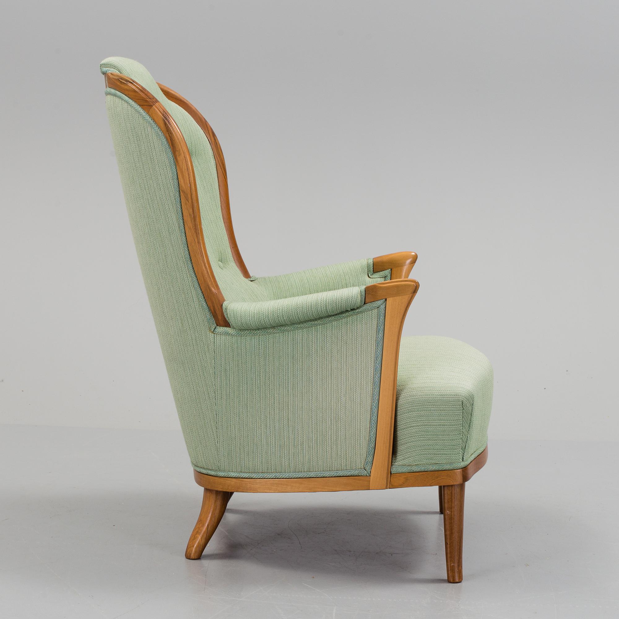 a Carl Malmsten "Vår Fru" armchair from the second half of the 20th century.