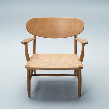 HANS JØRGEN WEGNER, Lounge Chair, CH-22. For Carl Hansen & Sons, Odense. Design 1950.