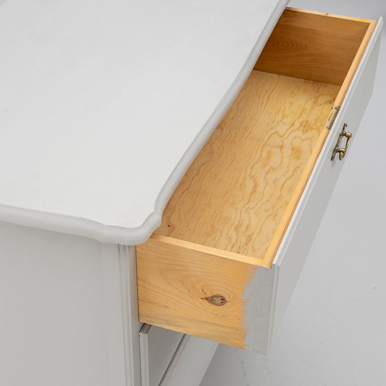 A chest of drawers, mid-20th century.