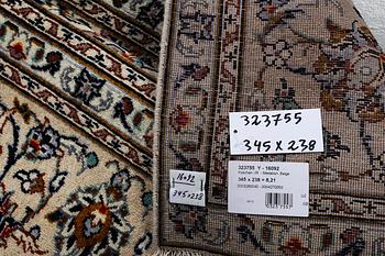 A carpet, Kashan, ca 345 x 238 cm.