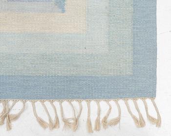 A flat weave rug, c. 240 x 163 cm.