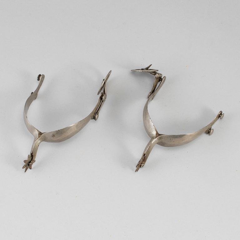 A pair of 19th century steel spurs.