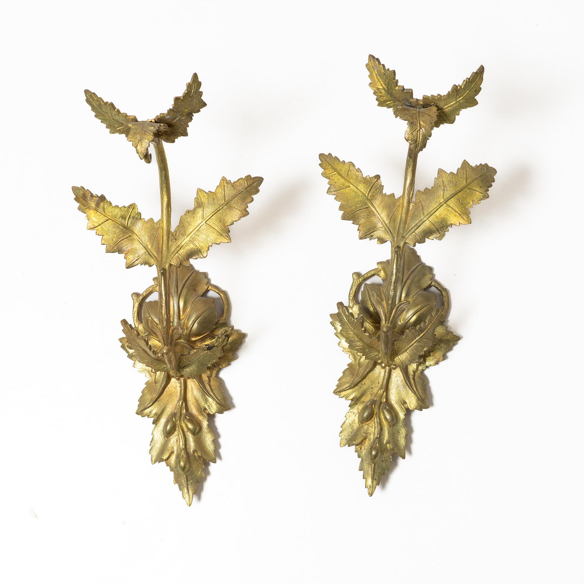 A pair of Oscarian wall appliques, late 19th century.
