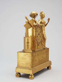 A French Empire early 19th century gilt bronze mantel clock.