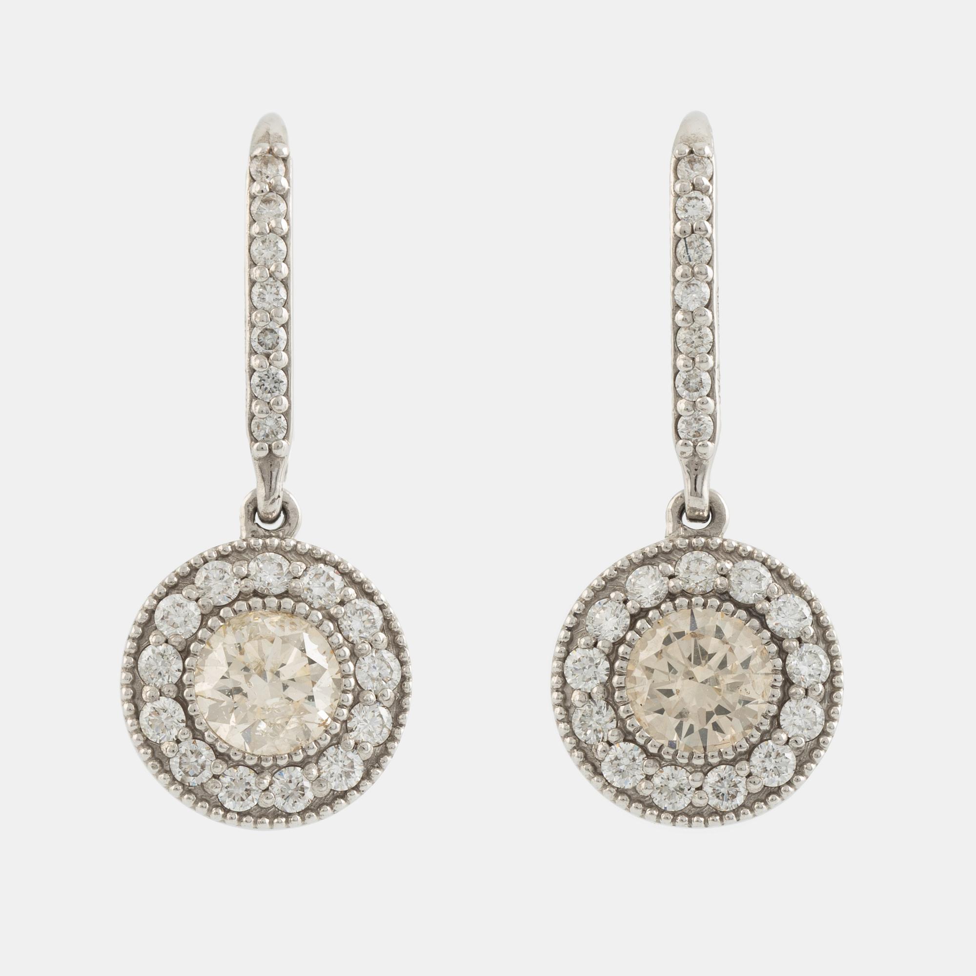 Brilliant cut diamond earrings.